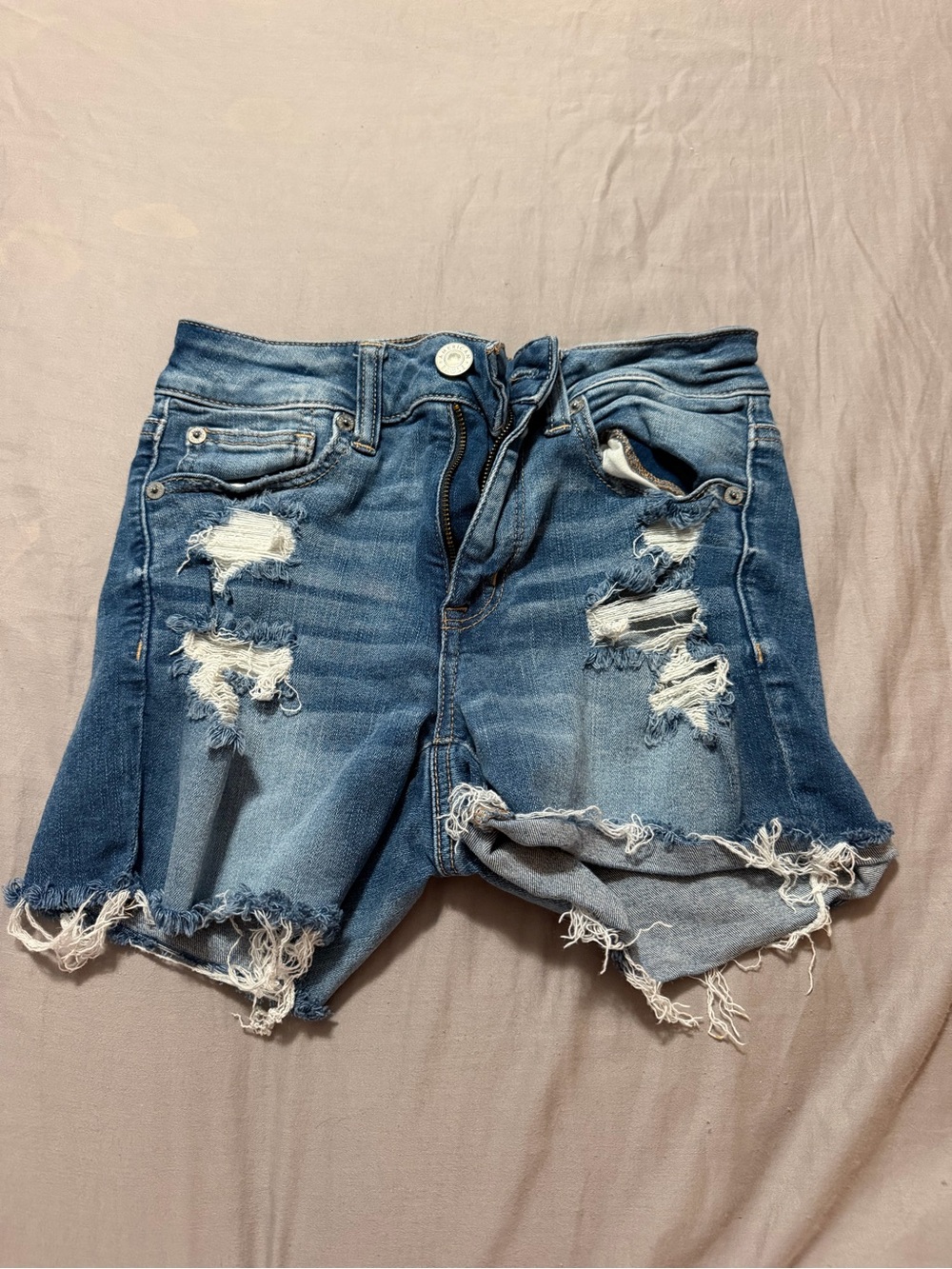 American Eagle Distressed Denim Cutoff Shorts Size 2 Blue Raw Hem Mid Rise